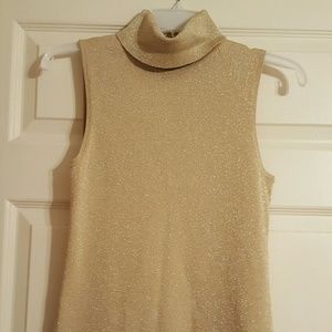 Gold sleeveless turtleneck